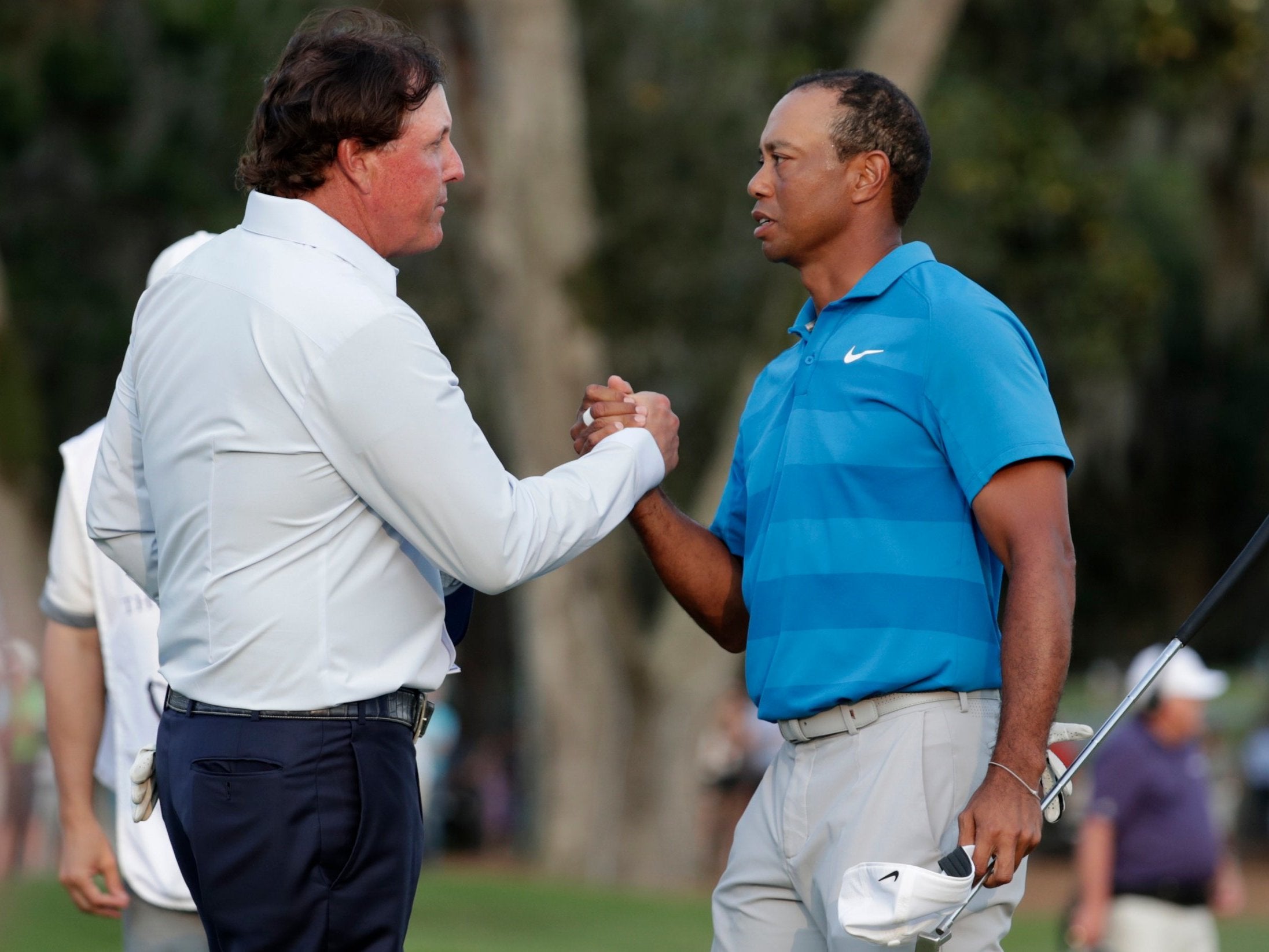 Phil Mickelson and Tiger Woods will go head to head