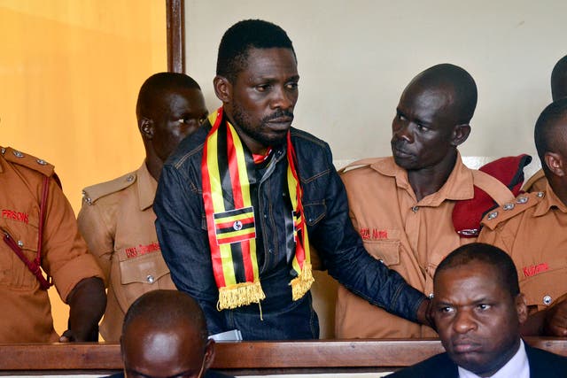 Robert Ssentamu limped during his appearance in military court and appeared to cry as he rubbed his eyes