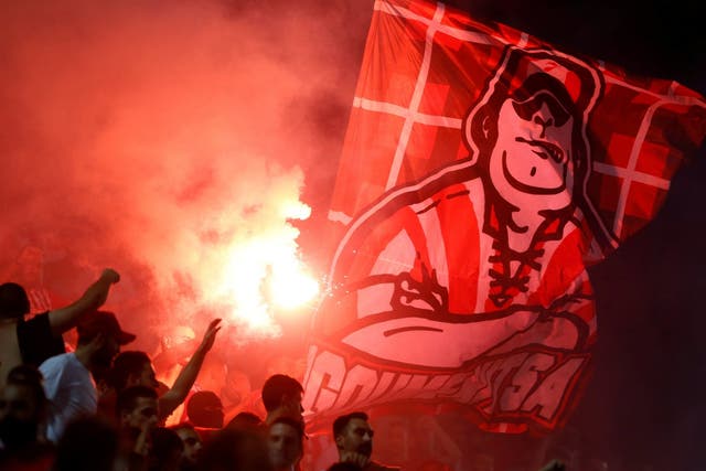 Olympiacos fans with a flare