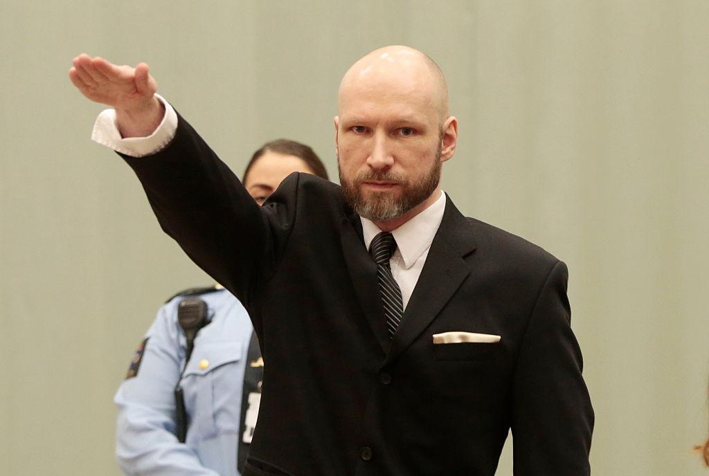 Anders Behring Breivik makes a Nazi salute ahead of an appeal hearing in January 2017 [image not from film] (AFP/Getty)