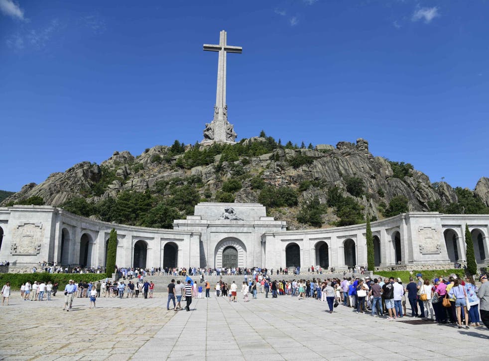 Tourists queue to view Franco’s tomb in the basilica at the Valley of the Fallen near Madrid
