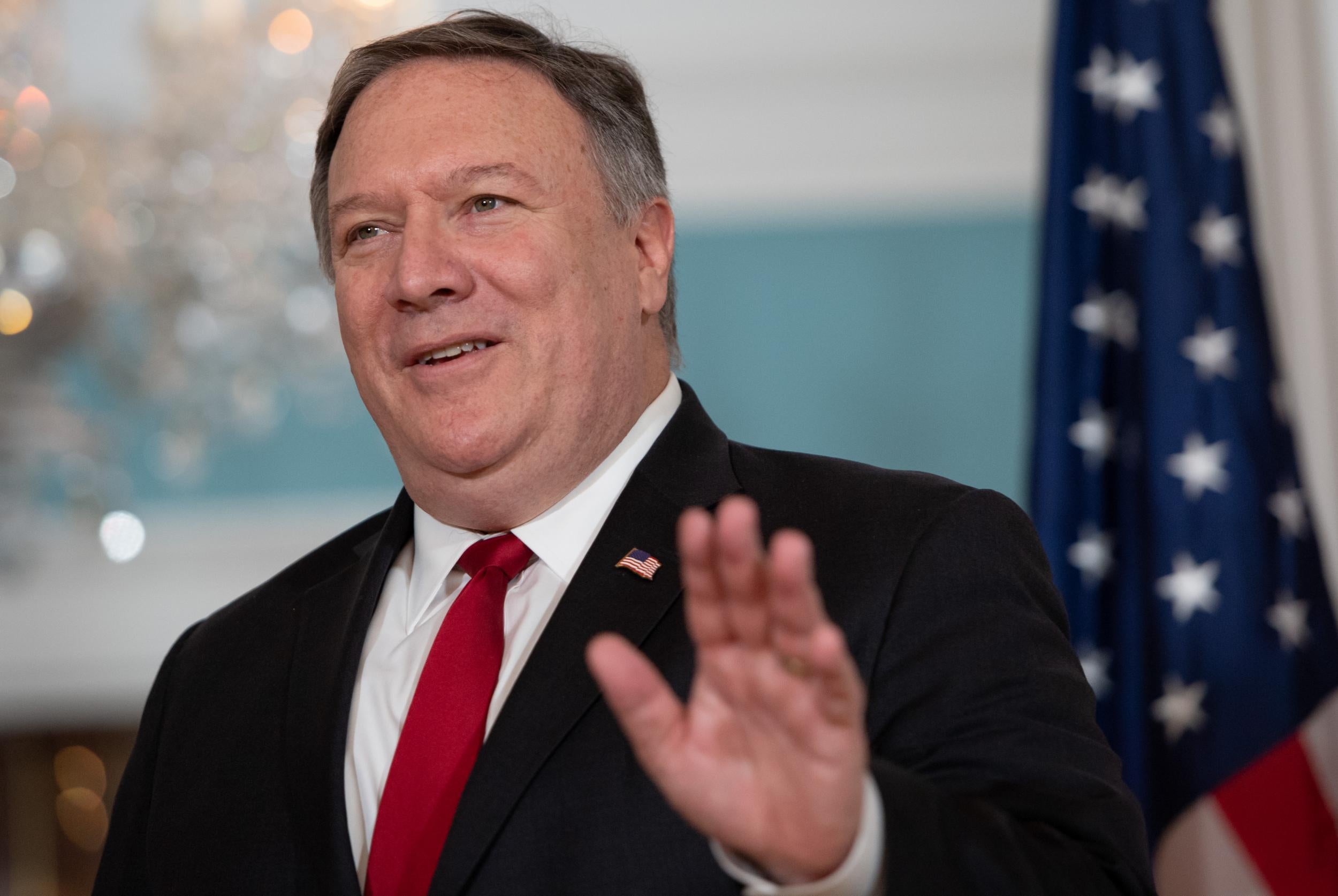 US secretary of?state Mike Pompeo waves to the media during a photo opportunity at the State Department (Saul Loeb/AFP/Getty)