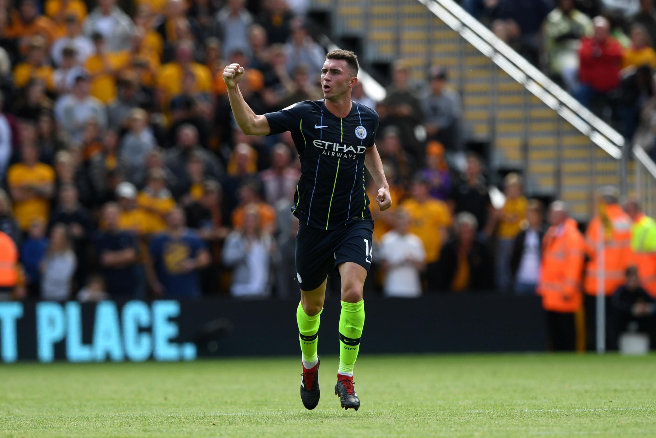 Aymeric Laporte celebrates his headed equaliser for Wolves