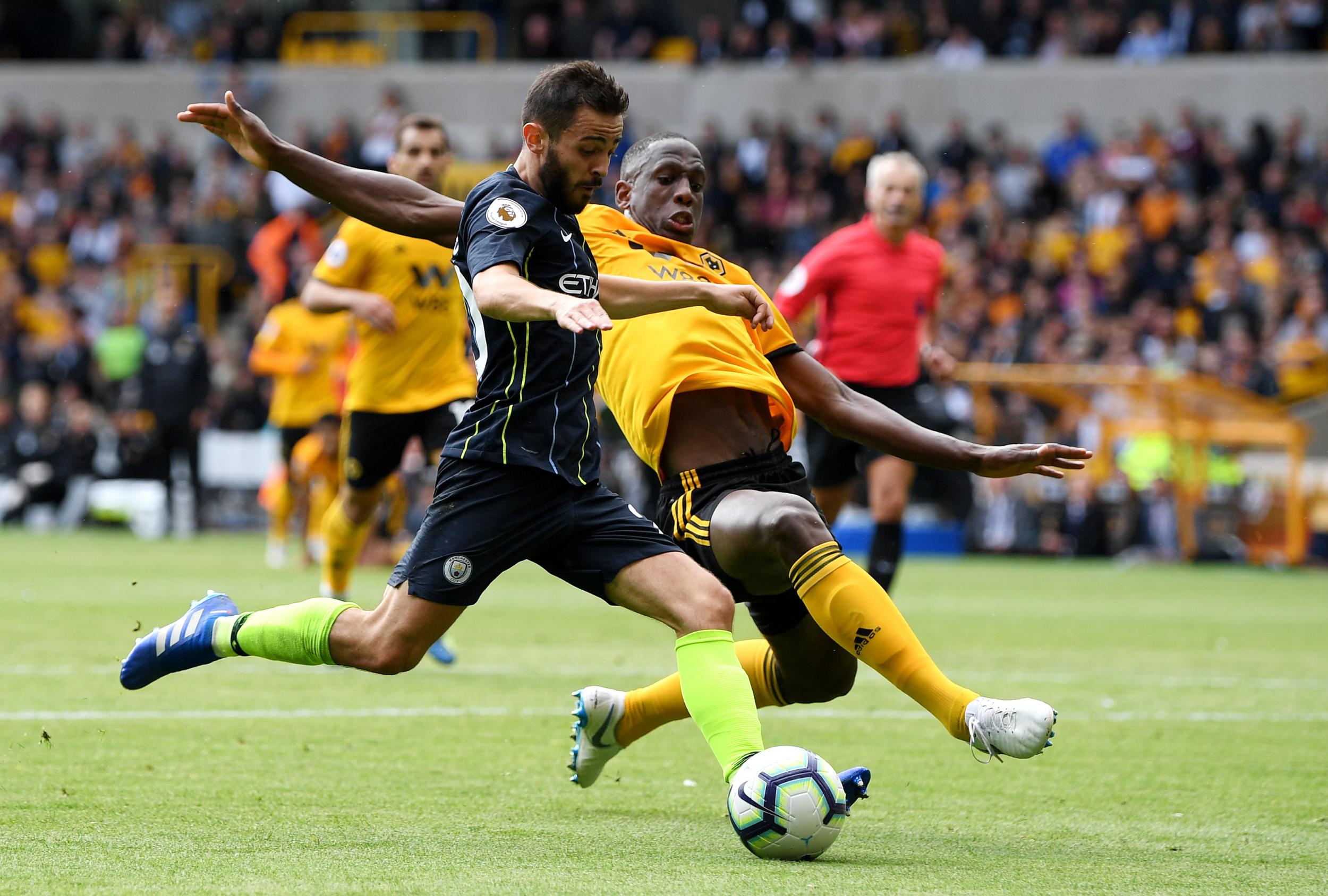 Bernardo Silva attempts to deliver a box into the Wolves box