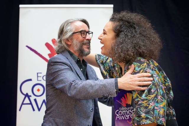 Edinburgh Comedy Award winner Rose Matafeo receives her trophy from Steve Coogan. Matafeo is the first person of colour to take the prize