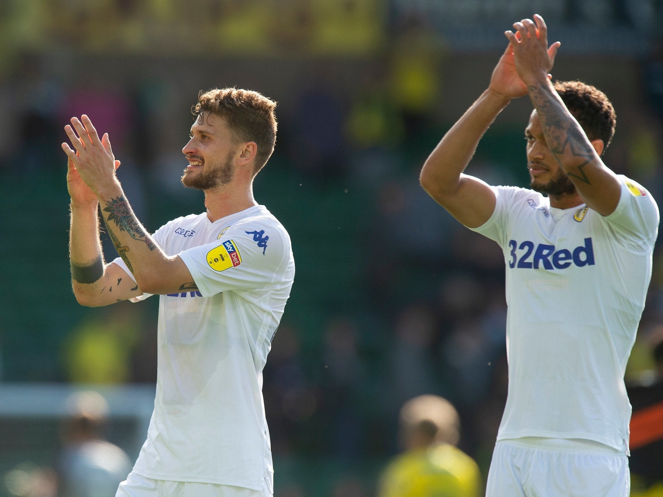 Leeds' players acknowledge their fans after the final whistle