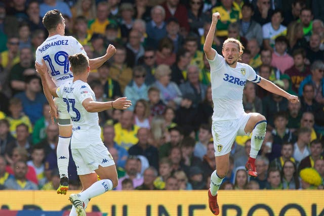 Pablo Hernandez (top left) celebrates scoring his side's third goal of the game