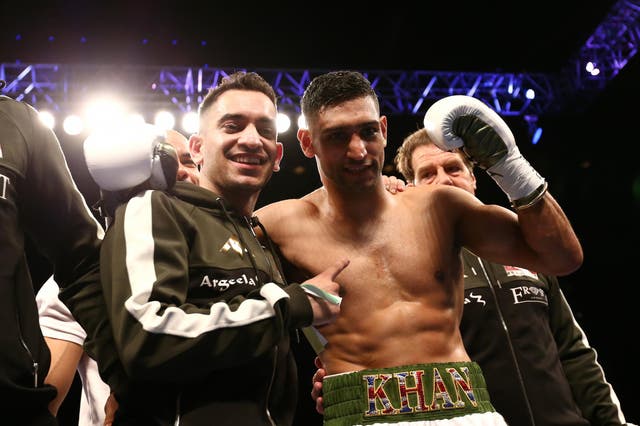 Amir Khan celebrates with his camp