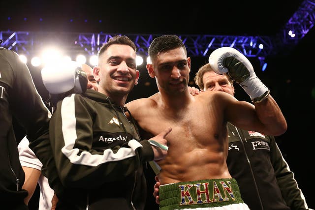 Amir Khan celebrates with his camp