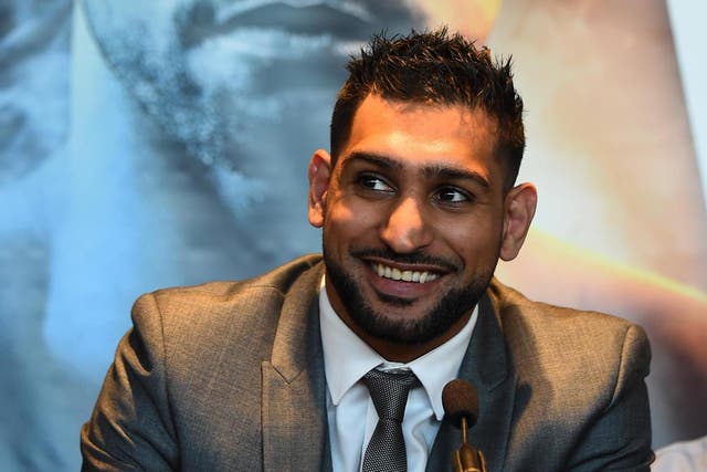 Amir Khan talks to the media during a press conference