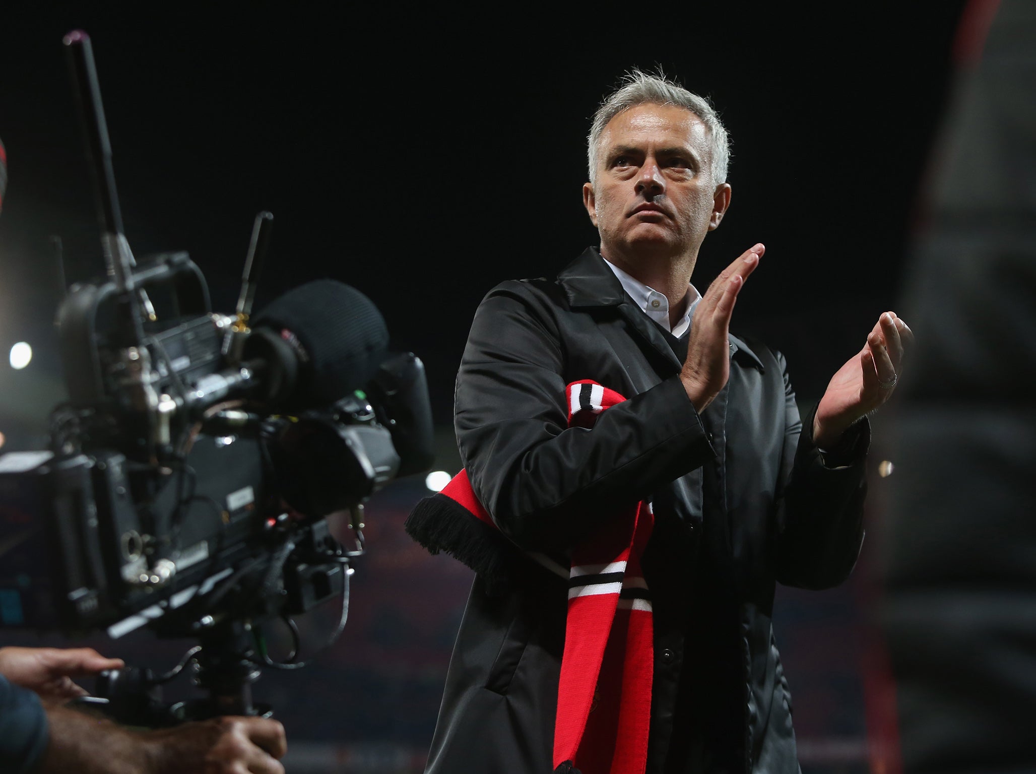 Mourinho stayed to applaud the United fans after the whistle (Man Utd via Getty)