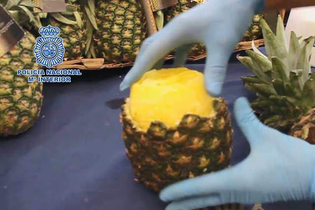 Police discovered more than 65kg of cocaine being hidden in pineapples at a market in Madrid