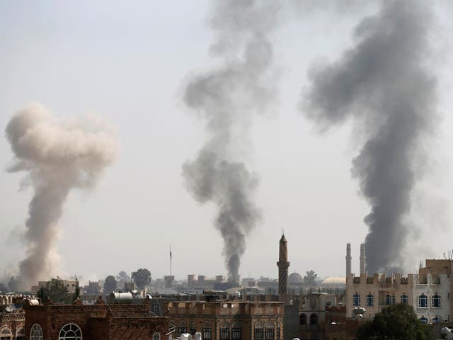 Smoke rises from the site of Saudi-led air strikes in Sana’a