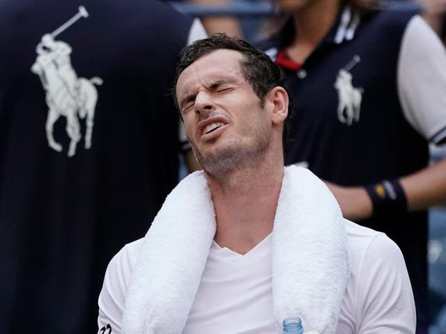 Andy Murray reacts after losing his serve