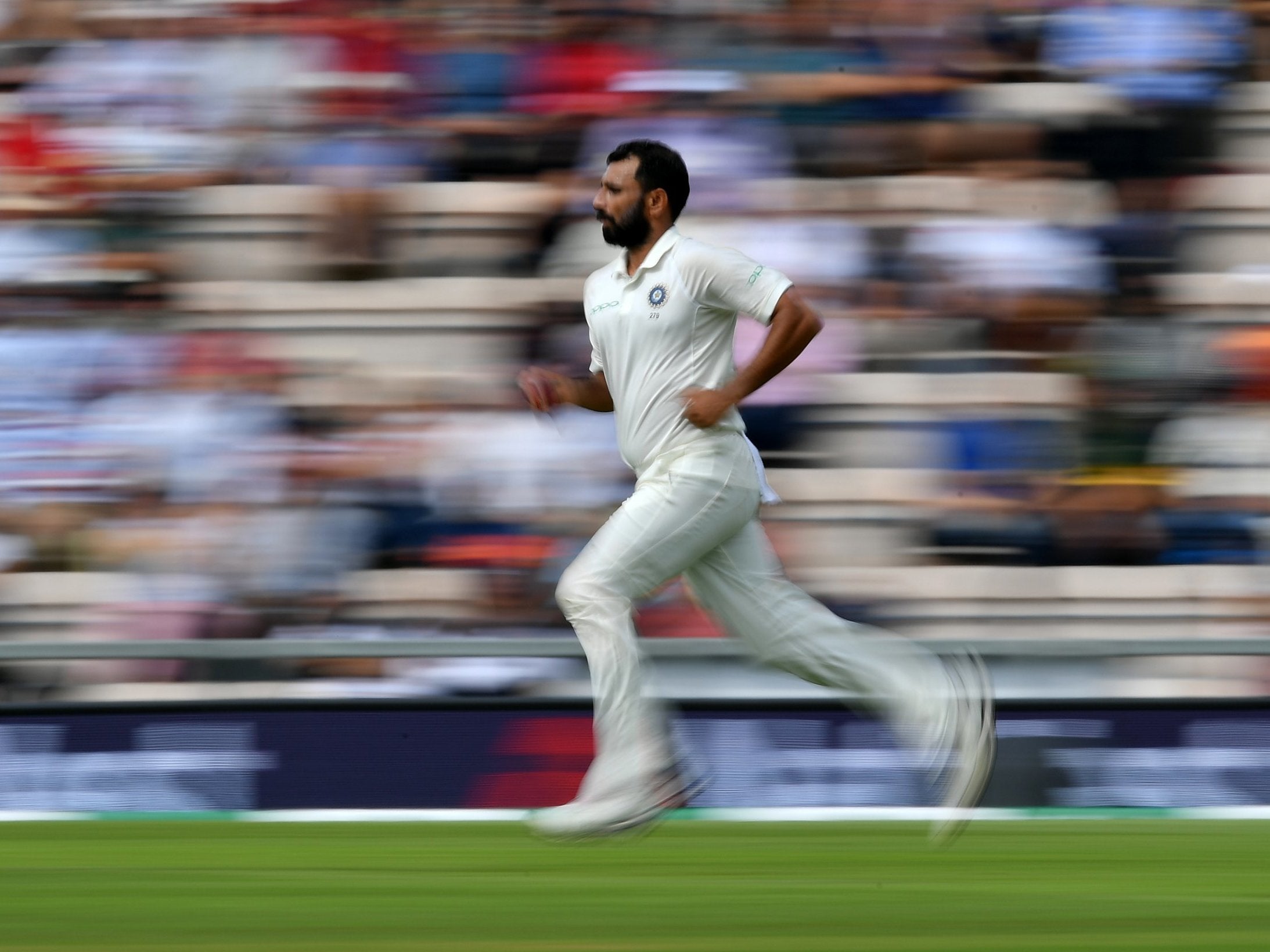 Mohammed Shami runs in to bowl