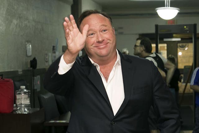 Alex Jones, a right-wing radio host and conspiracy theorist, arrives at the courthouse in Austin, Texas. A judge has denied conspiracy theorist Jones' request Wednesday, Aug. 29, 2018, to dismiss a lawsuit surrounding the 2012 Sandy Hook Elementary School massacre that he has called a hoax.