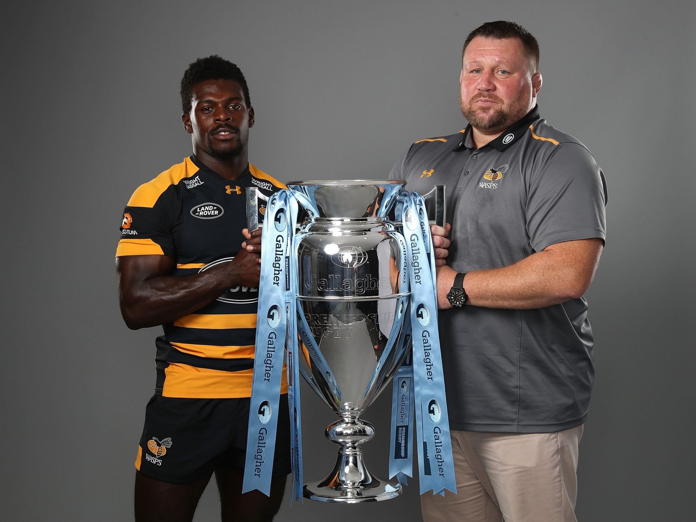 Wade (pictured with Wasps director of rugby Dai Young) is preparing for the new Premiership season