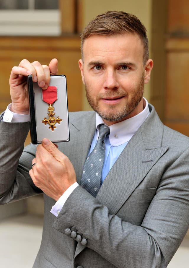 Gary Barlow, who was awarded an OBE for services to the entertainment industry and to charity