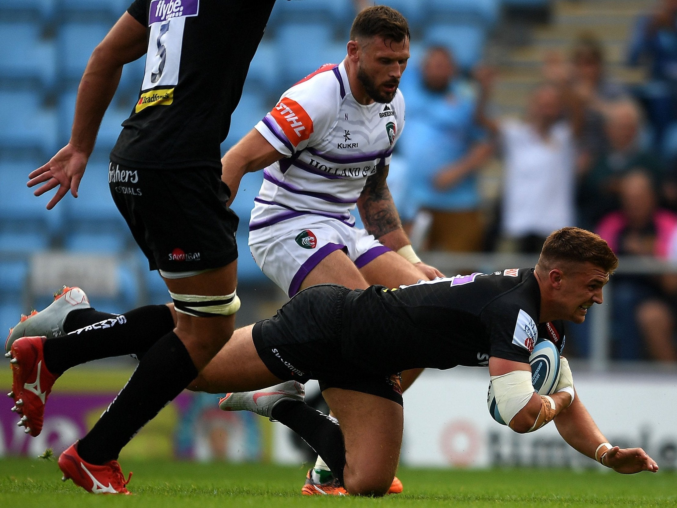 Henry Slade scores one of Exeter's six tries against Leicester
