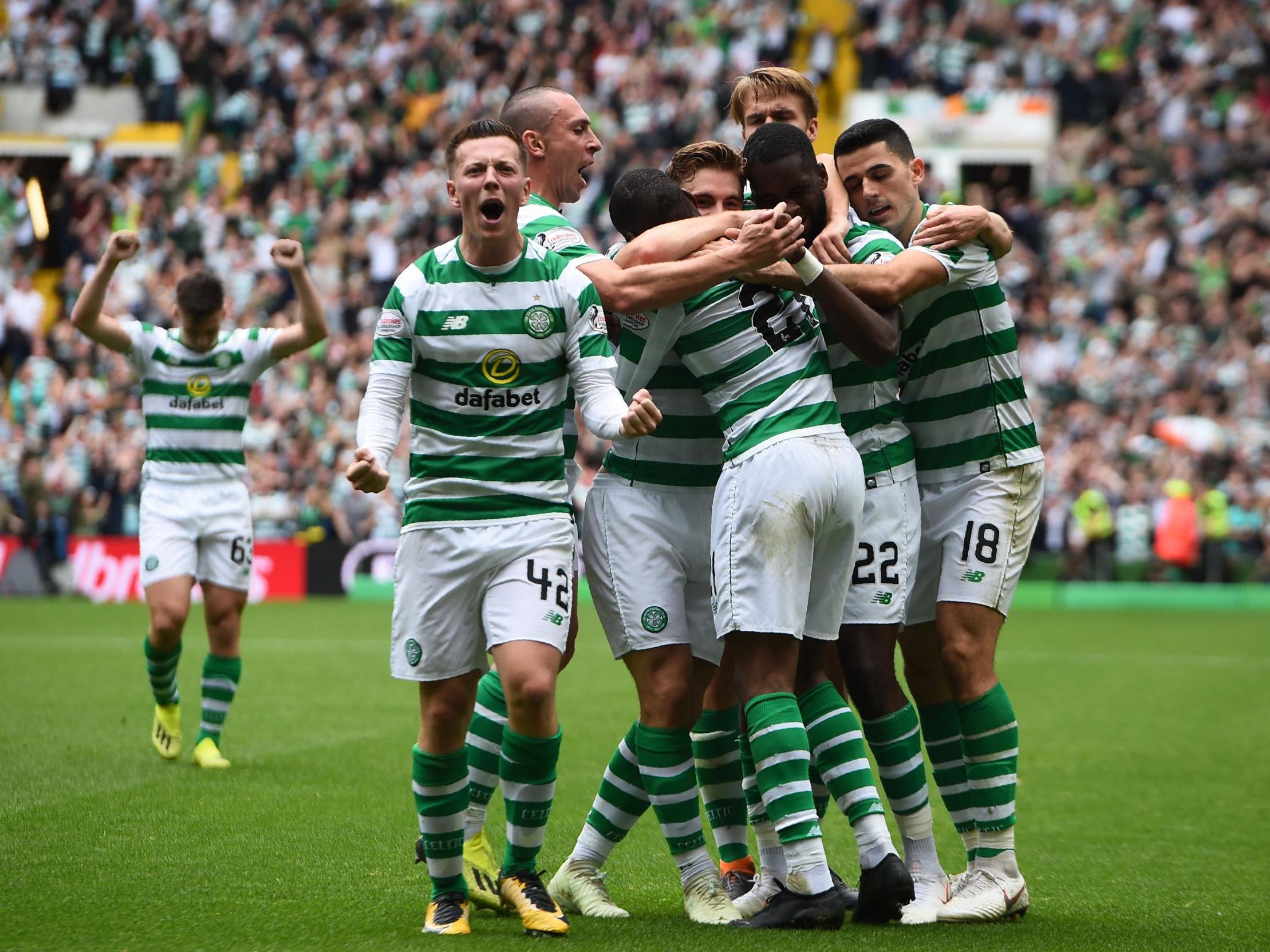 Celtic's players celebrate together after breaking the deadlock