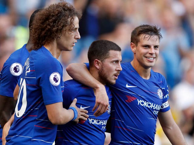 Chelsea's Eden Hazard celebrates with teammates after scoring his side's second goal