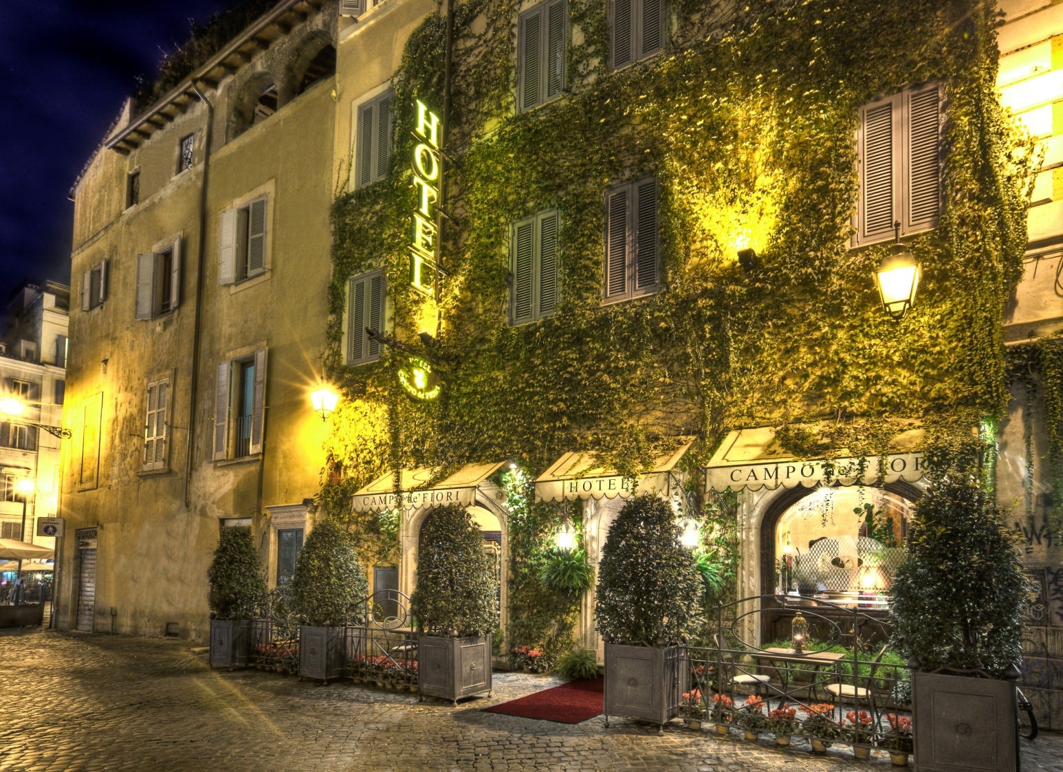 The romantic ivy-clad exterior of Hotel Campo De' Fiori