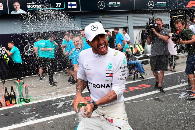 Hamilton celebrated his Monza victory after upsetting the home fans
