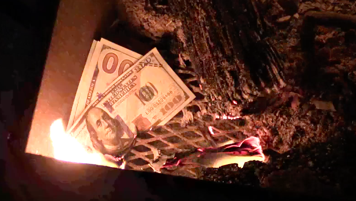 Then, we asked them to toss bundles of the notes into the fire