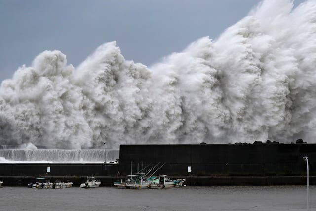 High waves hit breakwaters at a port of Aki, Kochi prefecture, as typhoon Jebi hits Japan