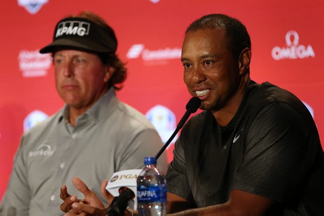 Tiger Woods and Phil Mickelson have been named as two of Jim Furyk's wild-card picks