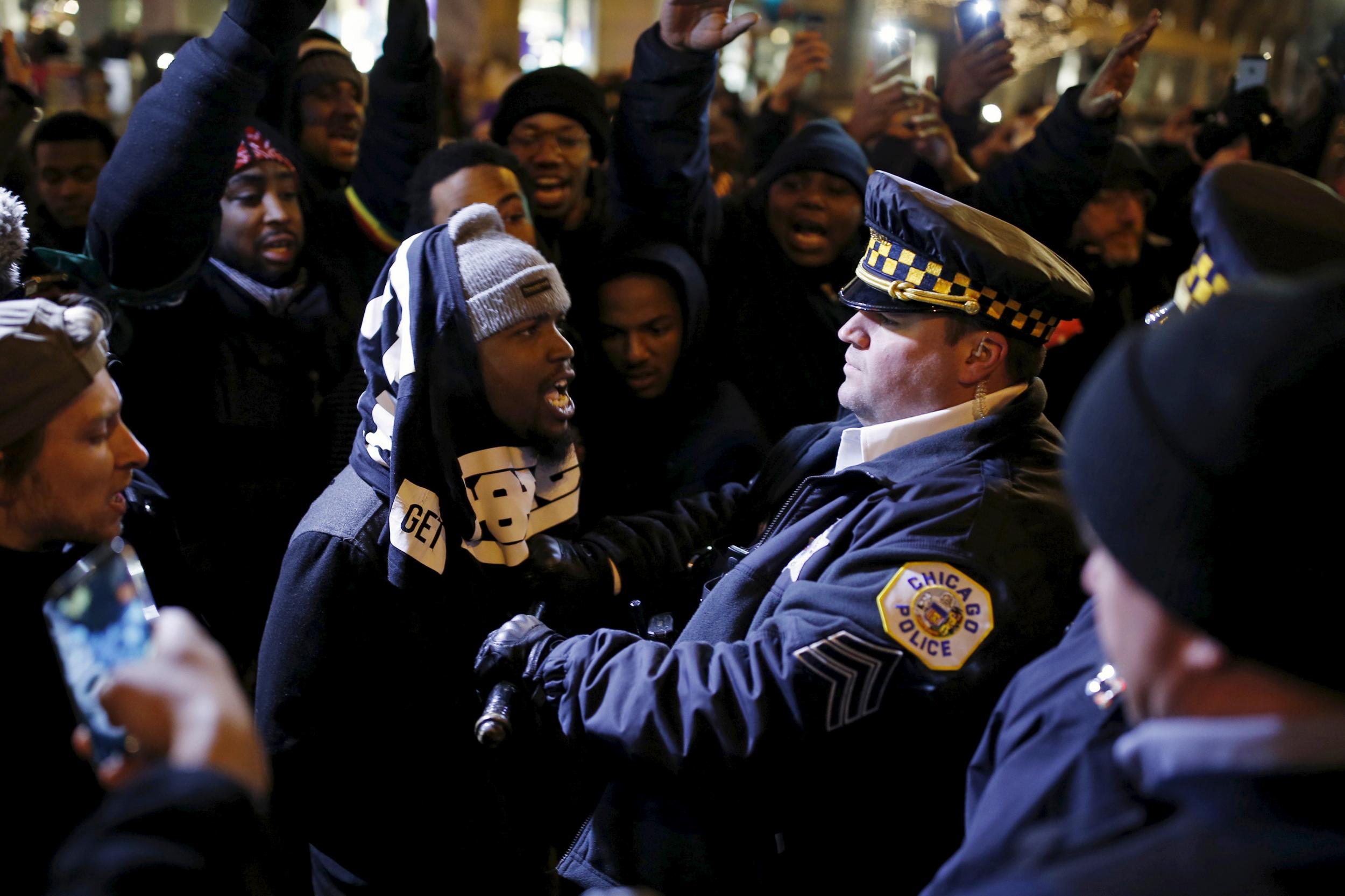 The fatal police shooting of teenager Laquan McDonald led to protests and outcry throughout Chicago, as seen in this 28 November 2015 photo. But there's no telling what citywide response the officer's murder trial will bring.
