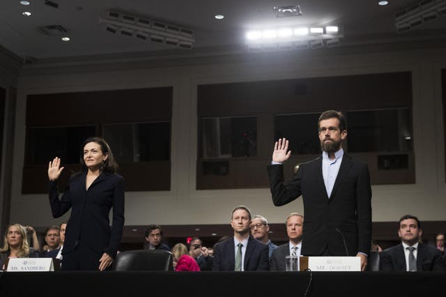 Facebook chief operating officer Sheryl Sandberg and Twitter chief executive officer Jack Dorsey are sworn-in for a Senate Intelligence Committee hearing