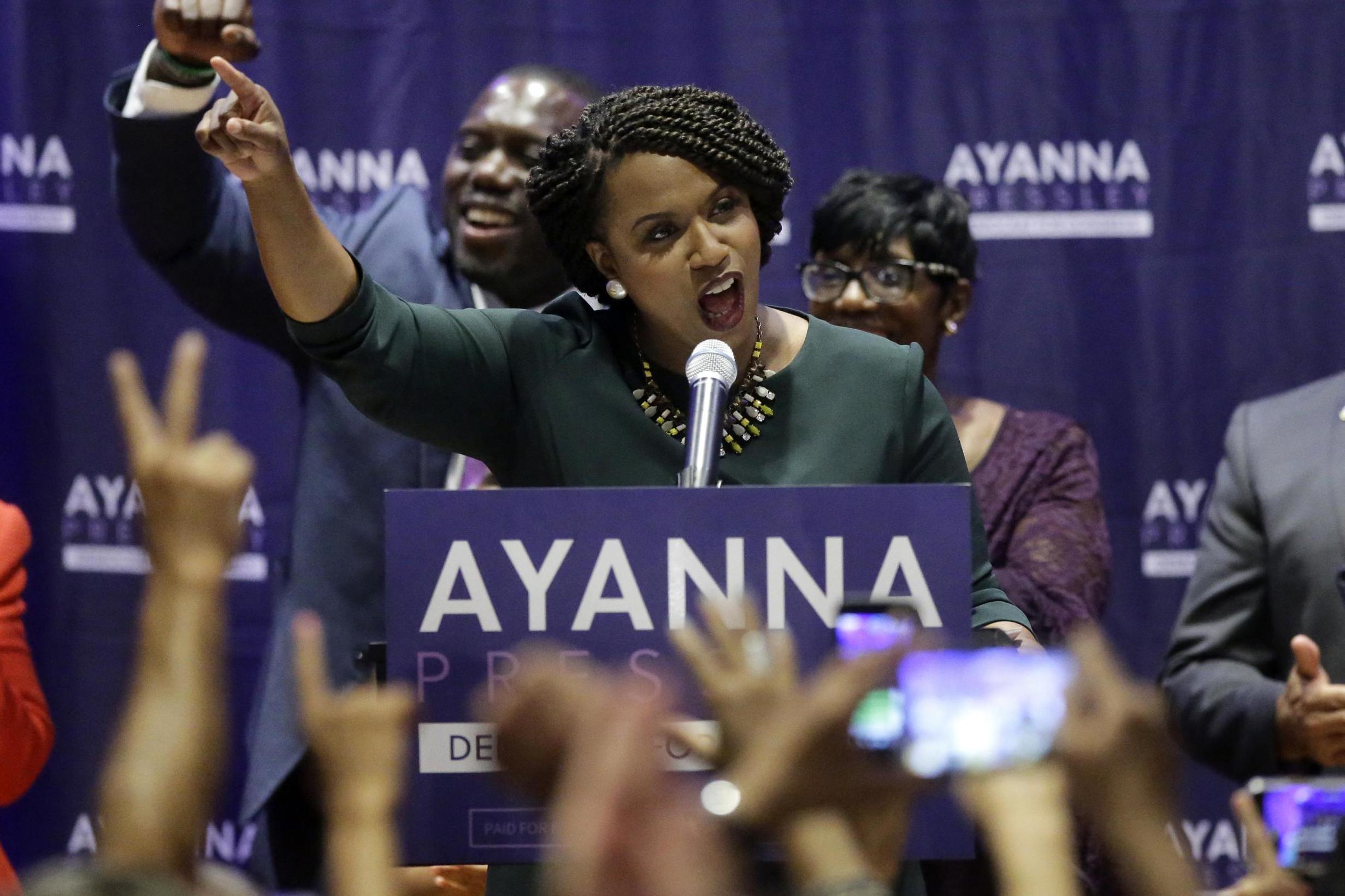 Boston City Councilor Ayanna Pressley, center, celebrates victory over US Rep. Michael Capuano