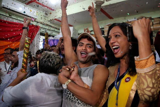 Supporters and members of the LGBT+ community celebrate in Mumbai after the India's top court struck down a colonial-era law that makes homosexual acts punishable by up to 10 years in prison