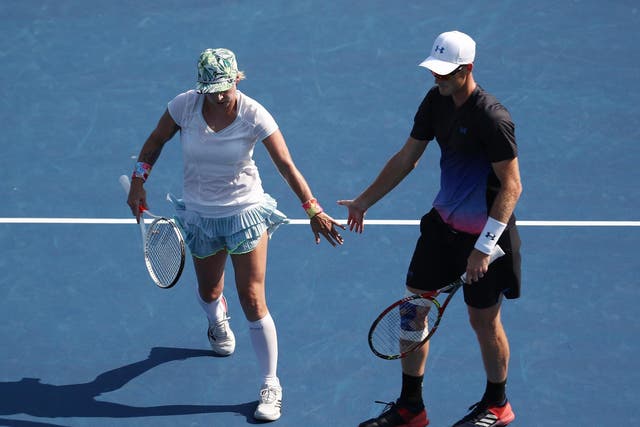Jamie Murray and Bethanie Mattek-Sands celebrate a point in their semi-final match against Christina McHale and Christian Harrison