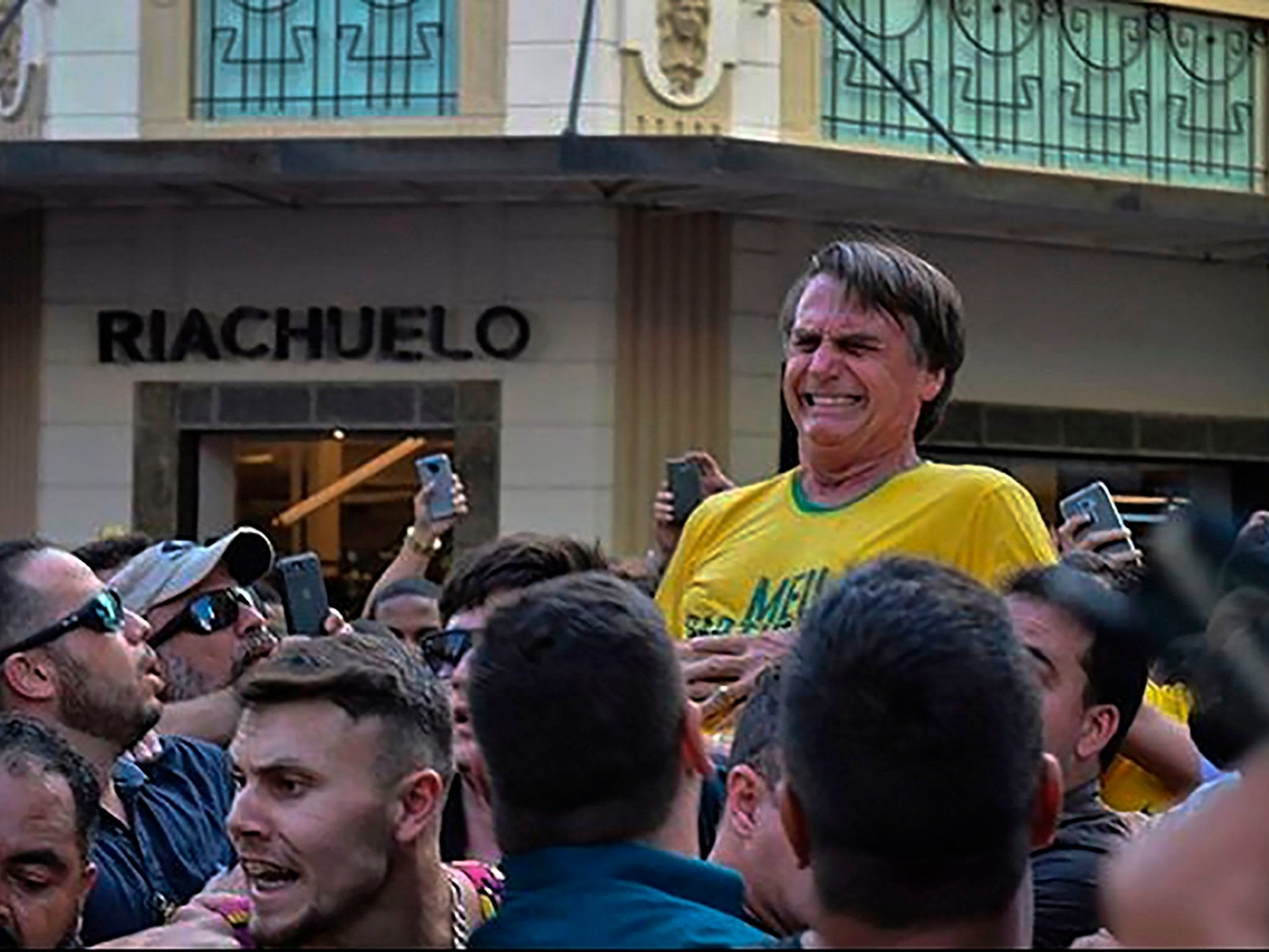 Jair Bolsonaro was stabbed while being held aloft at a campaign rally in Juiz de Fora