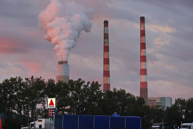 As emissions spew out of an American coal-fired power station, the 2015 Paris agreement remains in the balance