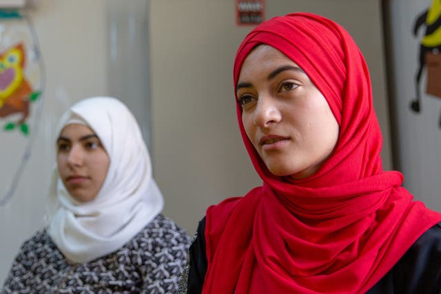 Syrian refugees Areej and Rula at a War Child activity centre in Zaatari refugee camp, northern Jordan