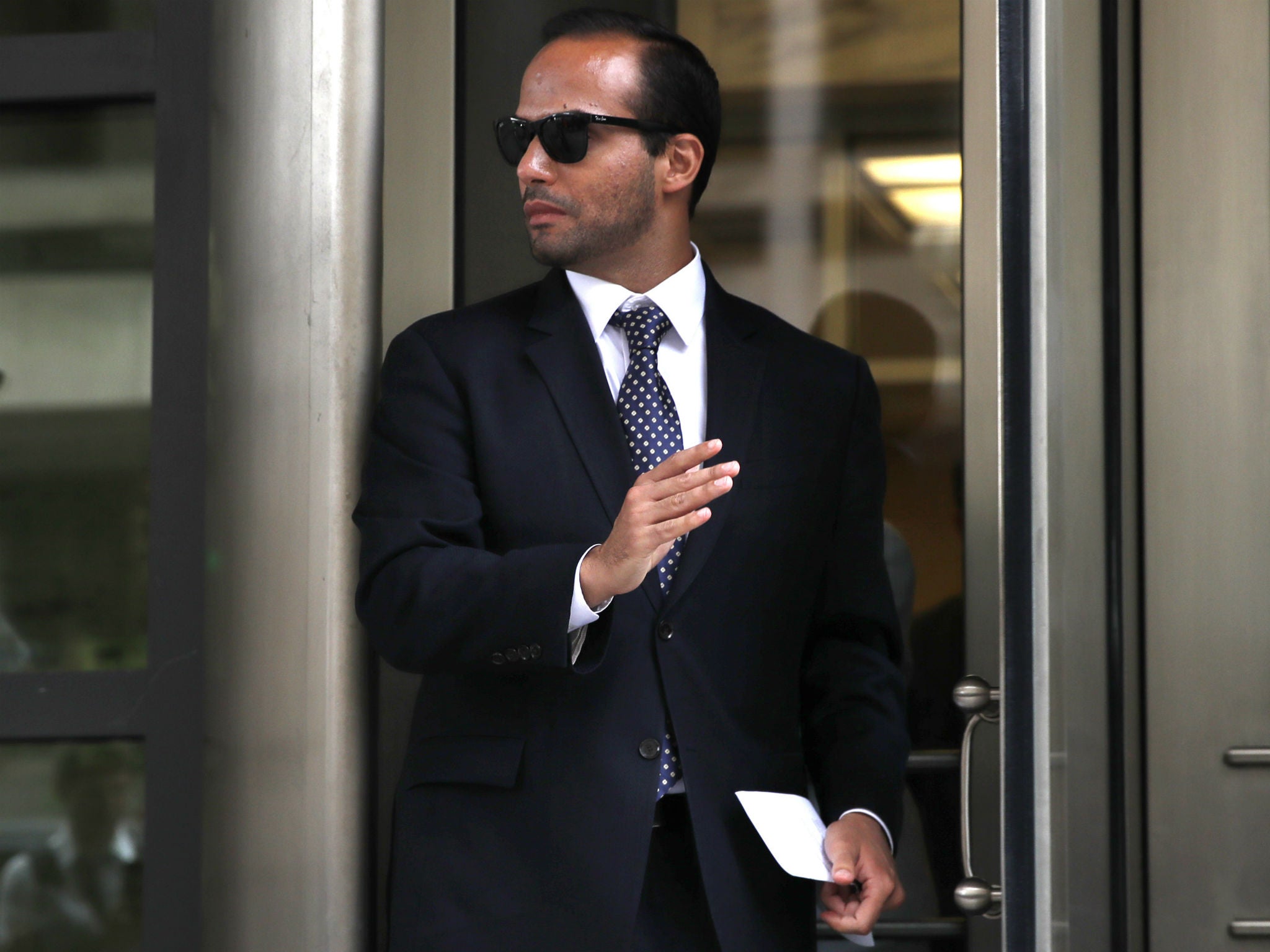 Former Donald Trump presidential campaign foreign policy adviser George Papadopoulos leaves court in Washington DC