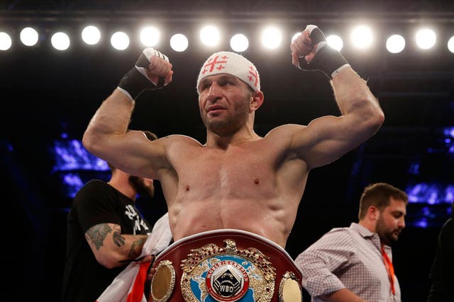 Avtandil Khurtsidze celebrating his interim WBA middleweight title win.  He has now been jailed for 10 years for his role as 'chief enforcer' for an organised crime syndicate 