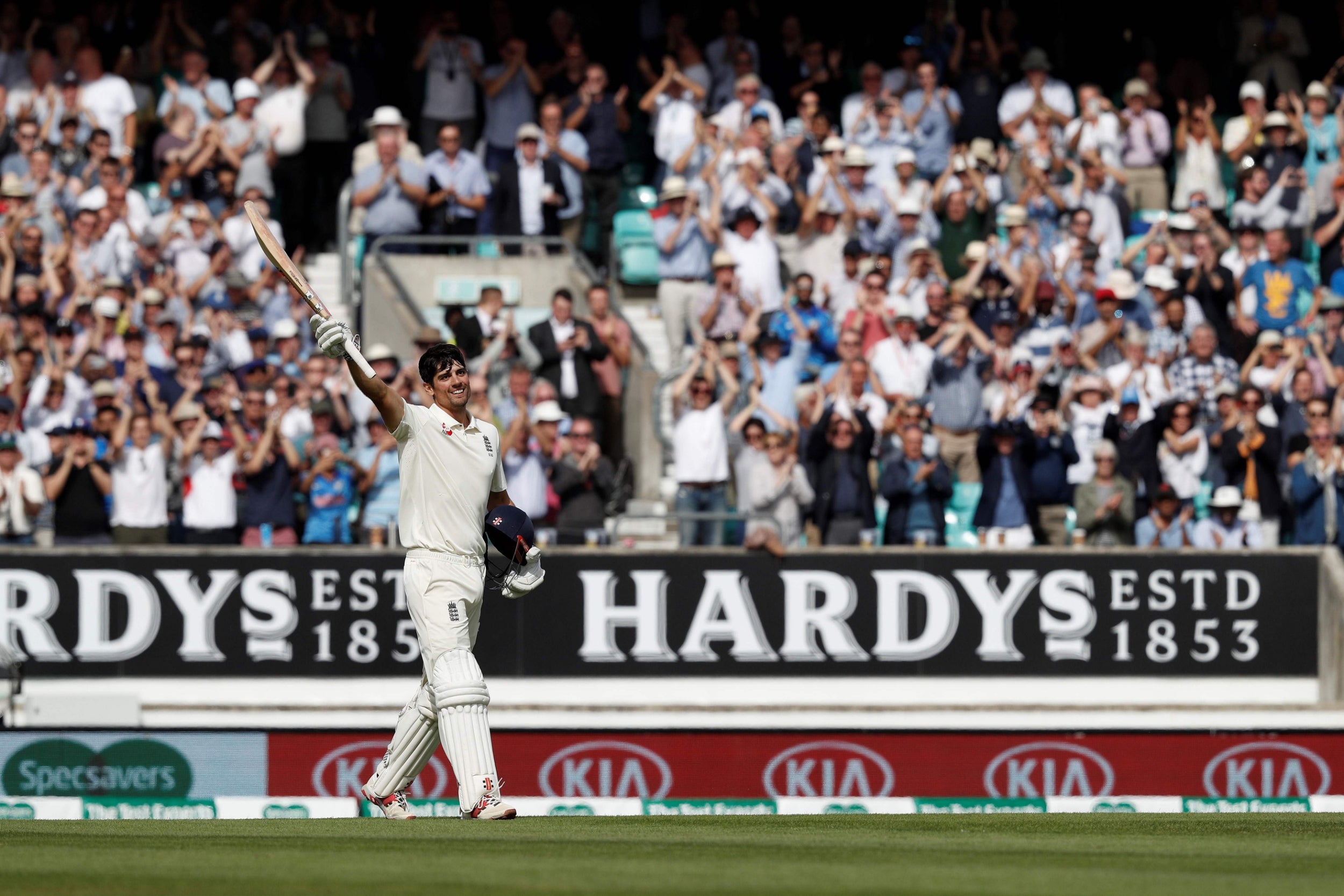 The England great acknowledges the crowds after reaching his century