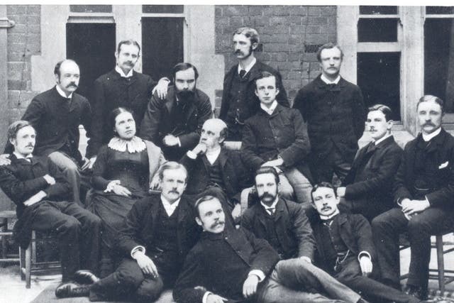 The early residents of Toynbee Hall, with Rev Samuel Barnett sitting to the right of his wife Henrietta
