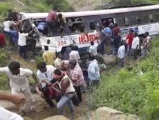 India bus crash kills at least 55 people as vehicle plunges off road
