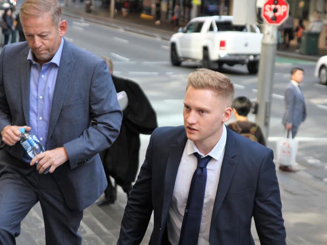 Sam Oliver (right) arriving at Downing Centre court in Sydney, Australia