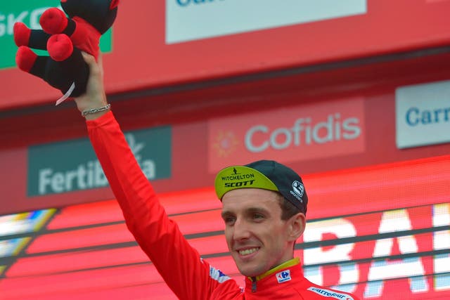 Briton’s Simon Yates retained the red jersey