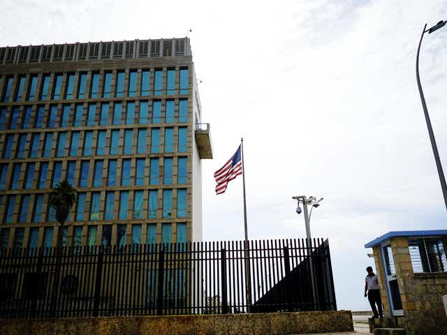 A security officer stands next to the US Embassy in Havana, Cuba