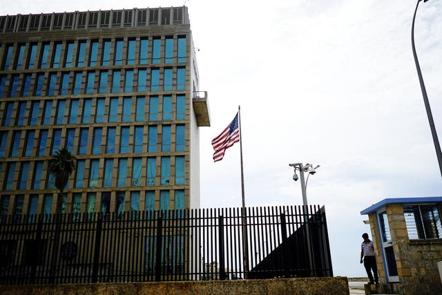 A security officer stands next to the US Embassy in Havana, Cuba