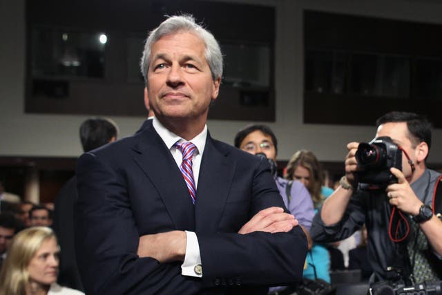 President and CEO of JPMorgan Chase Co. Jamie Dimon arrives to testify before a Senate Banking Committee hearing on Capitol Hill