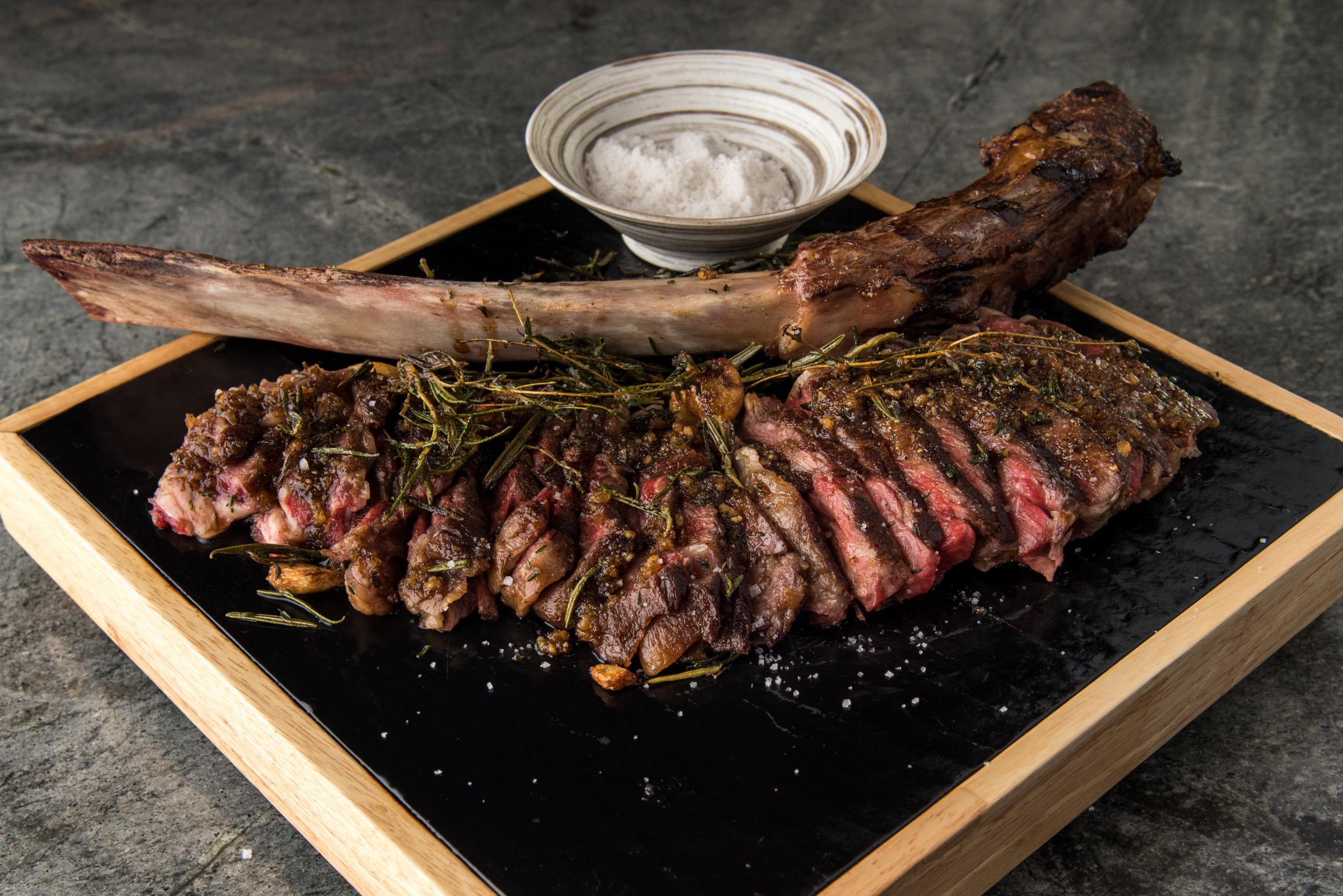 The giant tomahawk steak at rooftop Ce La Vi, atop Marina Bay Sands