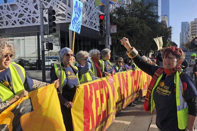 Protesters gathering outside the Global Climate Action Summit in San Francisco 